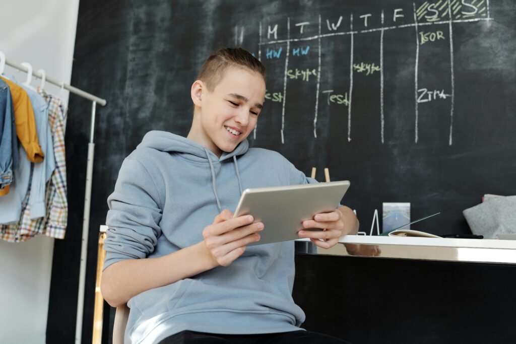 Teenage driver preparing for Texas learner's permit test online at home